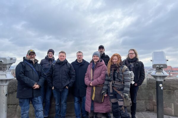 Gruppenfoto der MMC-Agentur auf der Kaiserburg während des Weihnachts-Events in Nürnberg